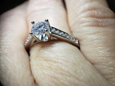 Moissanite 1/2 carat suspended stone with pave sides