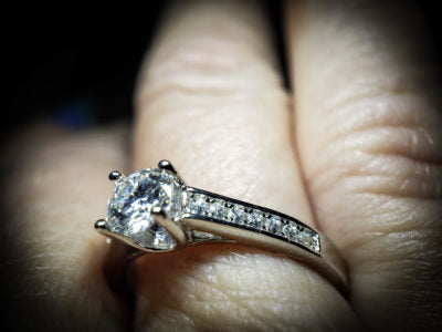 Moissanite 1/2 carat suspended stone with pave sides