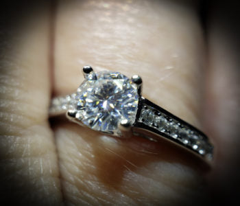 Moissanite 1/2 carat suspended stone with pave sides