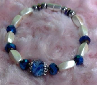 Blue handcrafted glass bead white bracelet